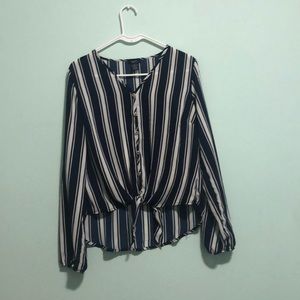Navy blue and white striped blouse.